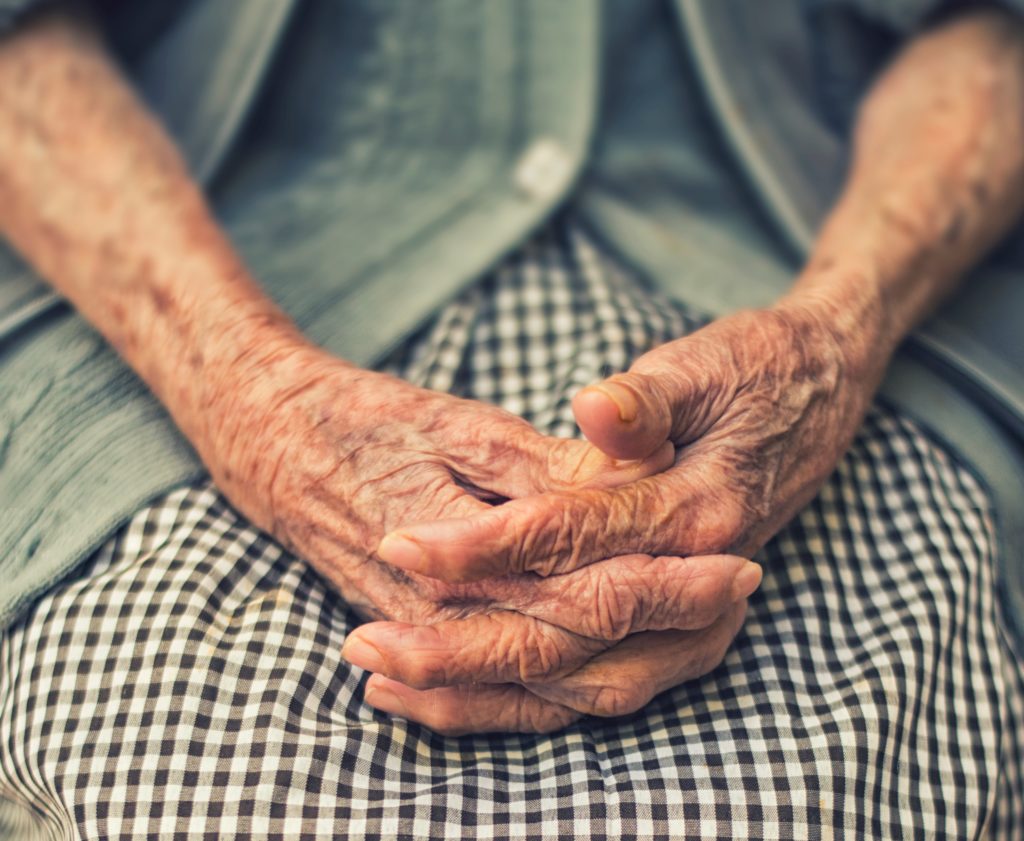 An elderly woman's hands